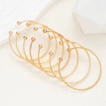 7-teiliges Armband-Set in Goldoptik